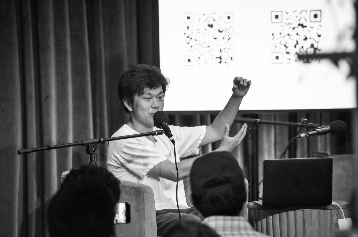 Speaker mid-talk during a workshop session